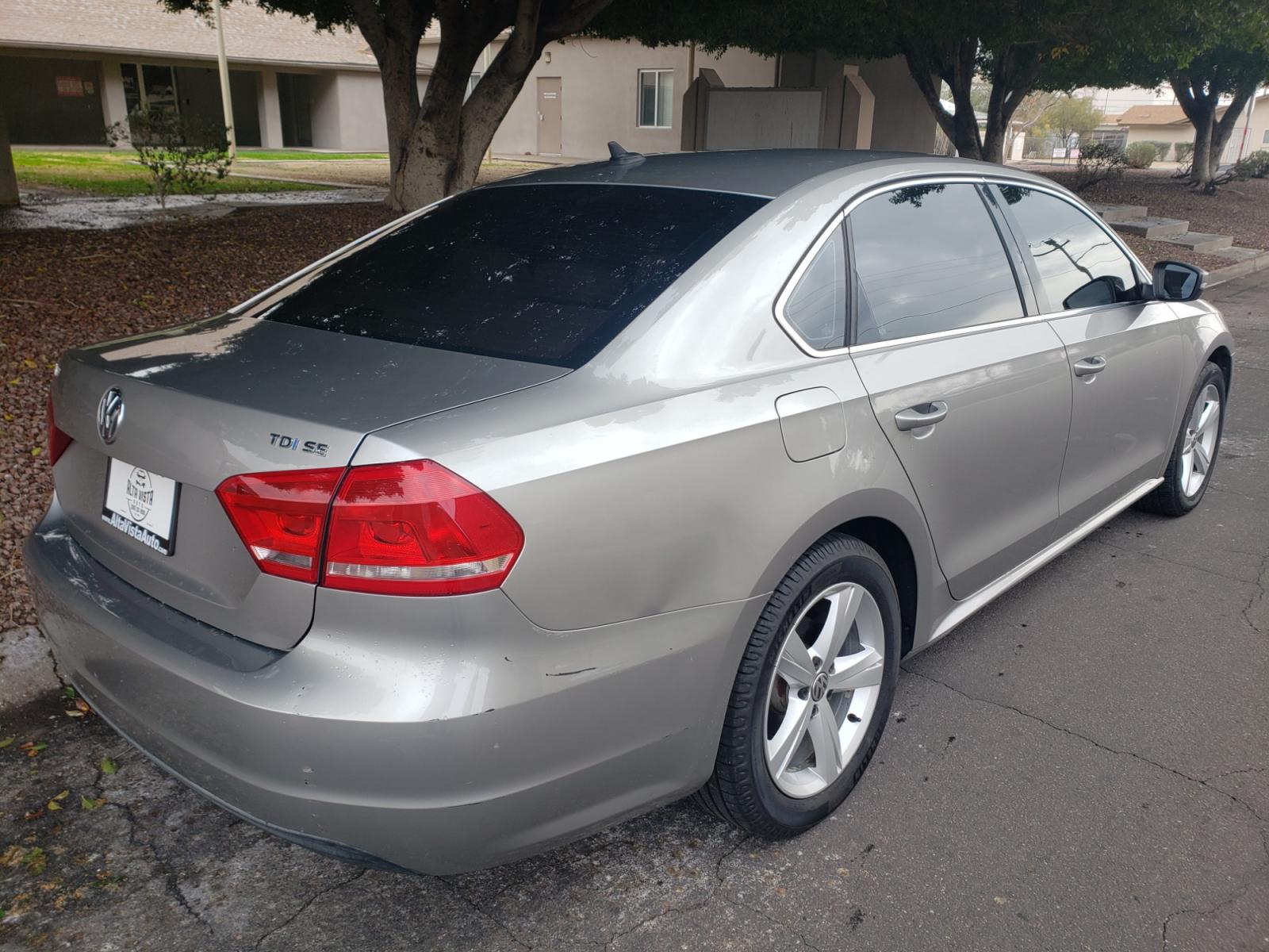 2013 /tan Volkswagen Passat SE (1VWBN7A32DC) with an 2.0L L4 DOHC 16V engine, 5-Speed Automatic transmission, located at 323 E Dunlap Ave., Phoenix, AZ, 85020, (602) 331-9000, 33.567677, -112.069000 - 2013 Volkswagen Passat TDI SE,....... ONLY 128K Miles..... EXCELLENT condition, A Real Must See!!.... No accidents, Ice cold ac front and rear, Stereo/CD Player, Satellite compatible, Bluetooth, Phone sync, Clean Tan interior with Tan Leather seats in near perfect condition, Gorgeous tinted sunroof, - Photo #3